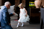 little bridesmaid showing her grandad her ballet shoes.photo by Charlotte Boswell
