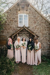 5 bridesmaids in dresses to suit their personalities in Blush with wand type flowers
